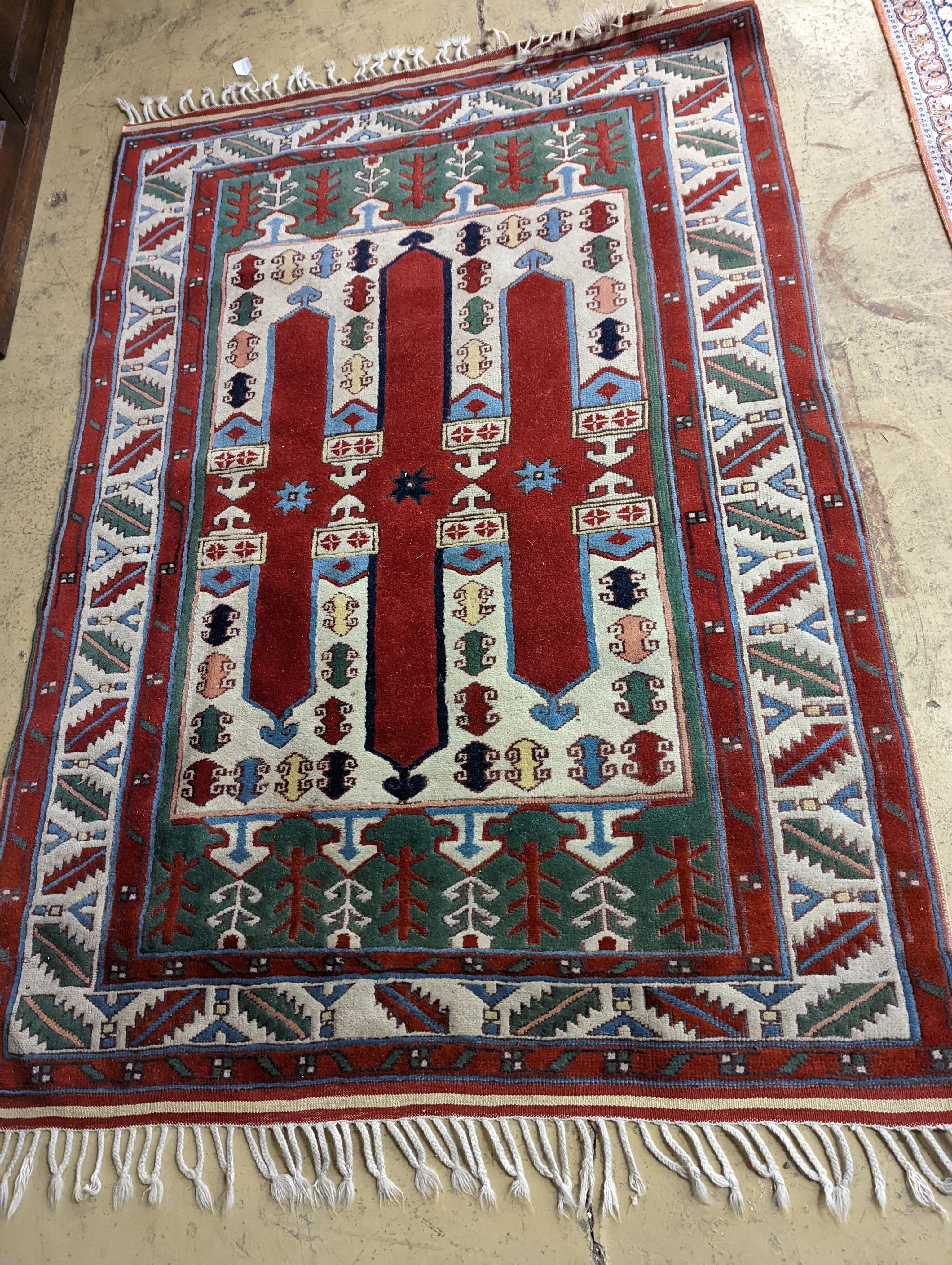 Two Turkish rugs and a Persian rugs. Largest, 284x172cm.